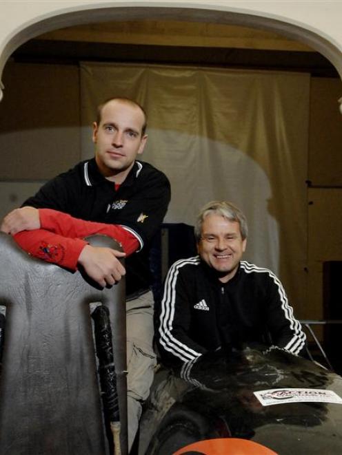 German sledding coaches Dirk Matschenz (left) and Gerd Grimme have been passing on their...