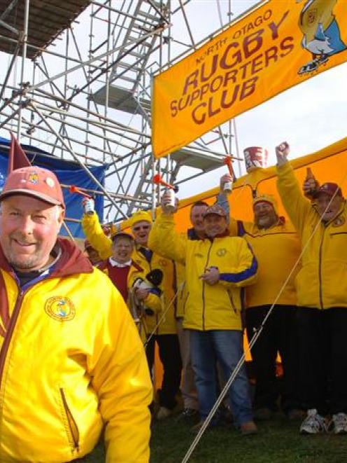 Steve Rawson and members of the North Otago Rugby Supporters Club show their support for North...
