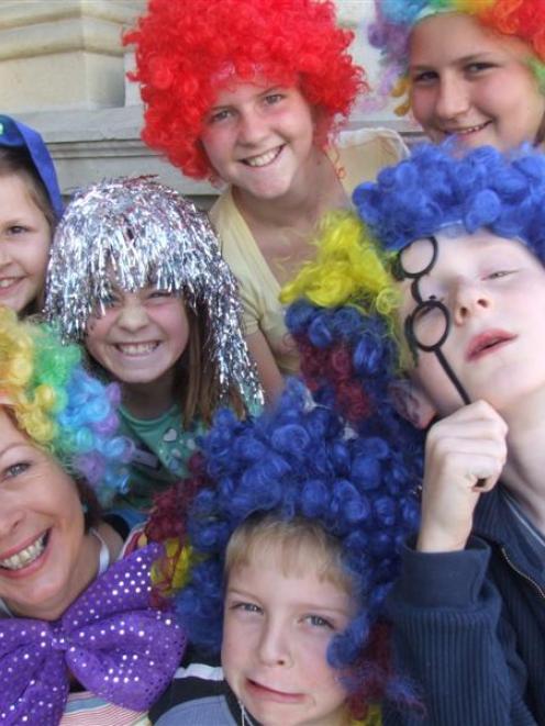 Drama teacher Sherilyn Hellier with (clockwise from top left) Philippa Elliffe (9), Ella...