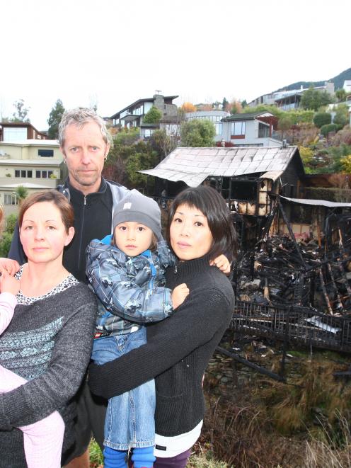 Queenstown fire victims (from left) Mia and Pam Hill with Cameron, Ryoko and Kai Mewburn. PHOTO:...