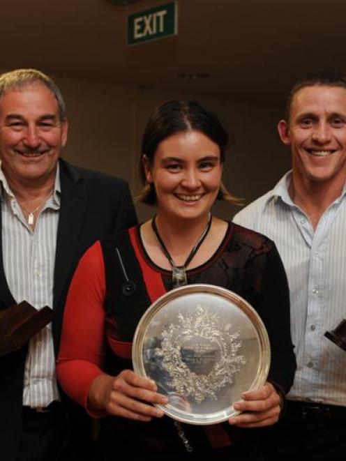 (from left) Peter Cameron, Sarah Tsukigawa and Craig Cumming hold the trophies they were awarded...