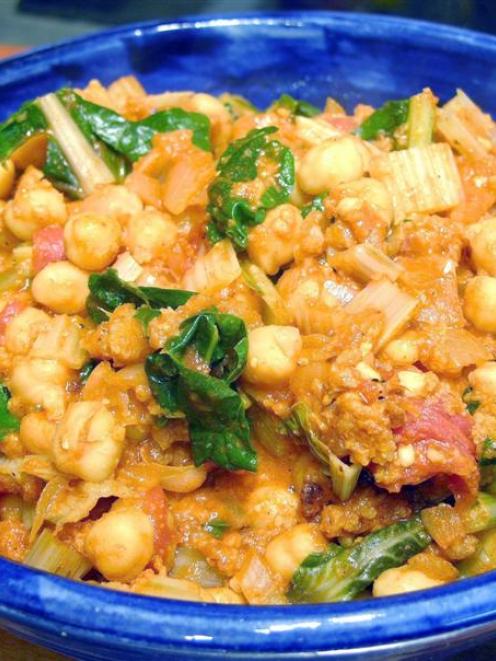 <p style="margin-bottom: 0cm"> Spanish chickpeas with silver beet or spinach. Photos by Charmian...