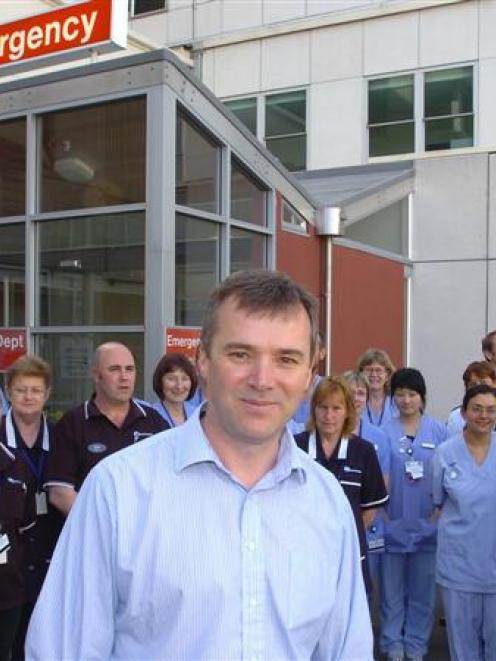 "Putting our Patients First" project leader Dr Tim Kerruish stands with emergency department...