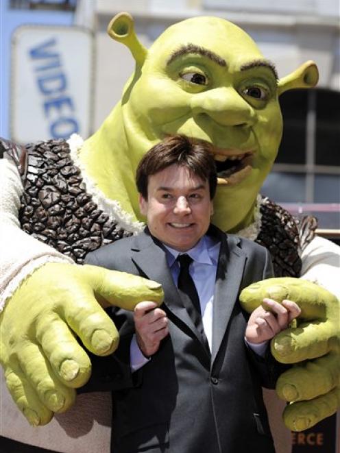 "Shrek" is joined by actor Mike Myers as the character receives a star on the Hollywood Walk of...