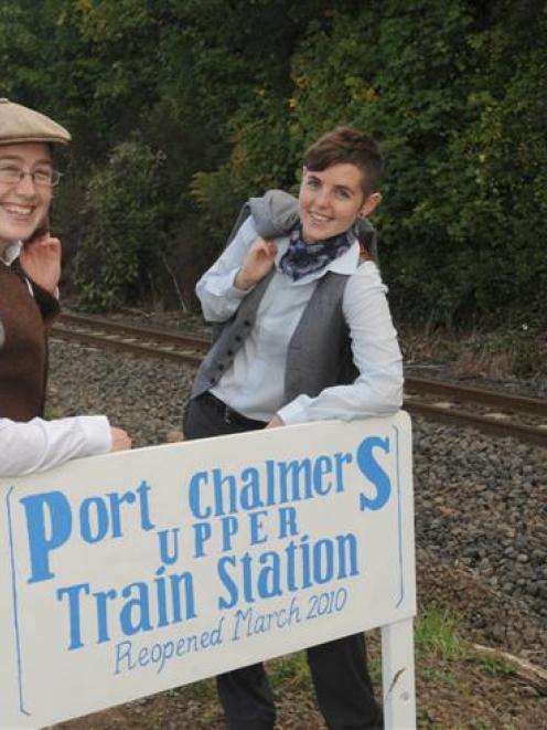 "Stationmasters" Sarah Orchard (left) and Joe MacDonald get ready for Port Chalmers commuters...