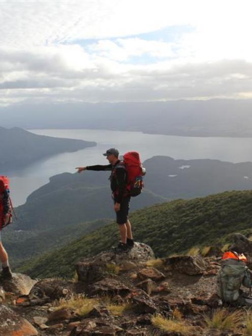 Taking in the vast landscape of the Kepler Track Great Walk - one of the nine being hiked  back...