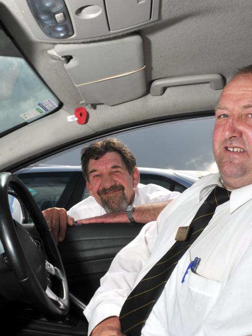 Taxi drivers Ross Smaill (left) and Anthony Ware are confident their cameras help to prevent...