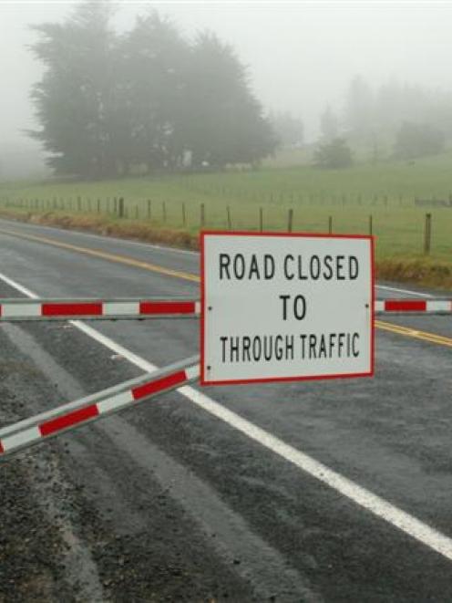Three Mile Hill Rd, near Dunedin, closed on Monday night following four road crashes, was...