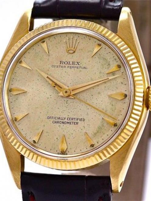 A 1958 gold Oyster Perpetual Rolex watch, almost identical to the one owned by Mr McCaw. Damaged...