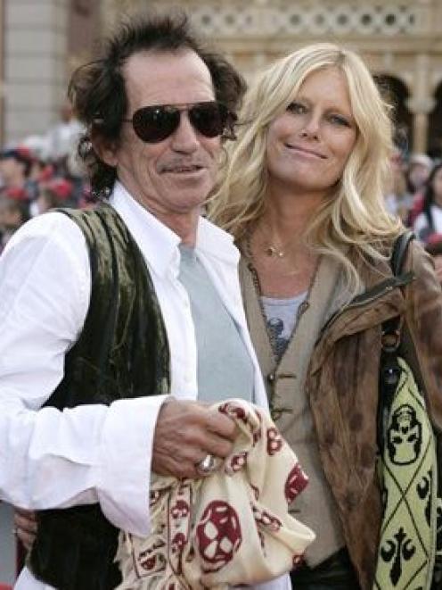 A 2007 AP file photo of Keith Richards, left, and his wife, Patti Hansen.