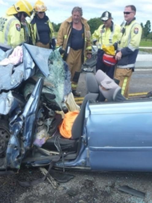 A baby died and three people were injured when this car crashed into a truck. Photo / TrustPower...