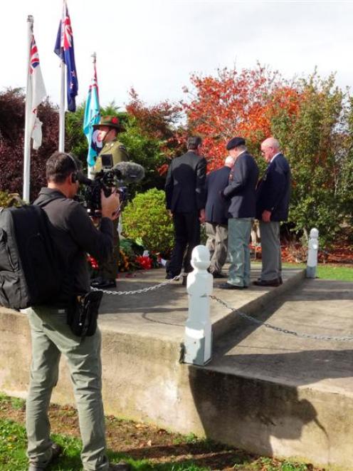 A cameraman films Sergeant Tyrone Rapana, of Waiouru, who is hosting a television series on war...