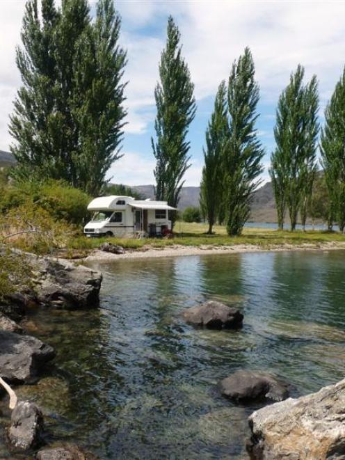 A camper van on the shore of Lake Dunstan. Photo supplied.