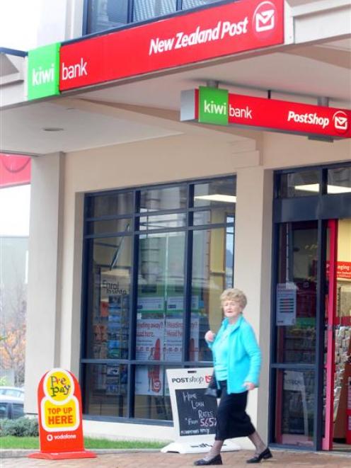 A customer leaves the Exchange Post Shop. Photo by Craig Baxter.