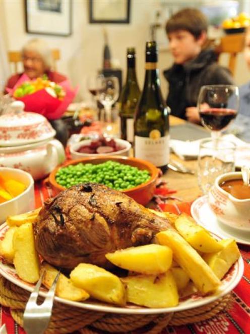 A family gathers to enjoy a roast dinner. Photos by Charmian Smith.