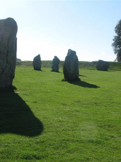 A few of the remaining standing stones at Avebury, in England. Most of the original 600 stones...