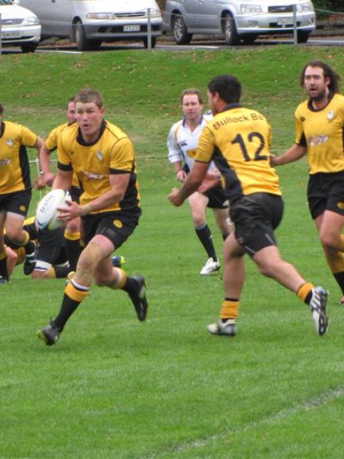 A first five-eighth Chris Jones runs a backline move in the game against  Wakatipu Wanderers at...
