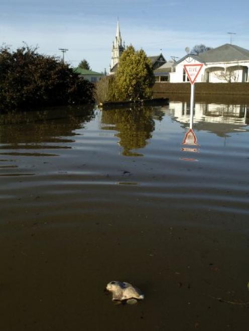 A flooded Ajax St,   Milton, in July 2007.
