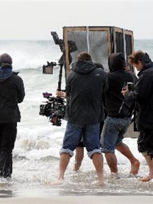 A German-led film crew films Elisabeth Lanz (far left), playing marine biologist Julia, for a...