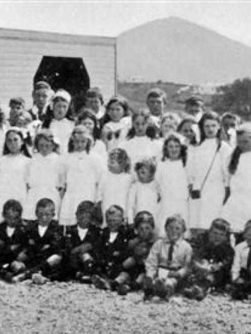 A group of pupils at the new Concord School, Burnside, with Mr W. J. Strong (headmaster) and...