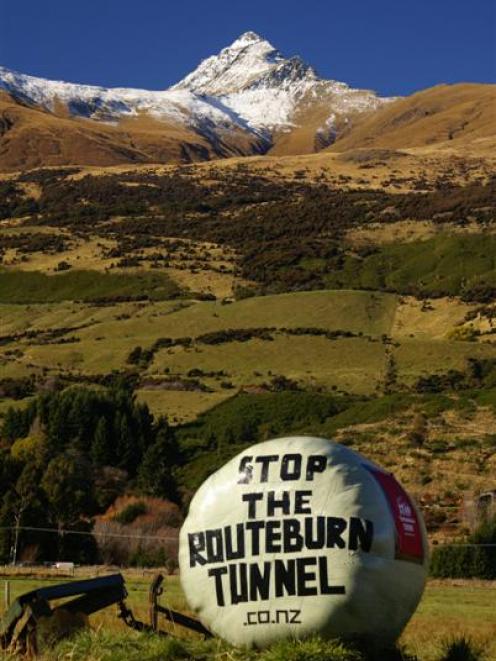A hay bale in Glenorchy spreads a message of opposition to the proposed  Milford Dart  tunnel....