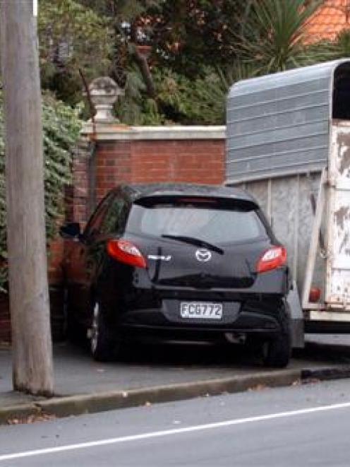 A horse float, which came free from its vehicle after losing a wheel, smashed into this parked...