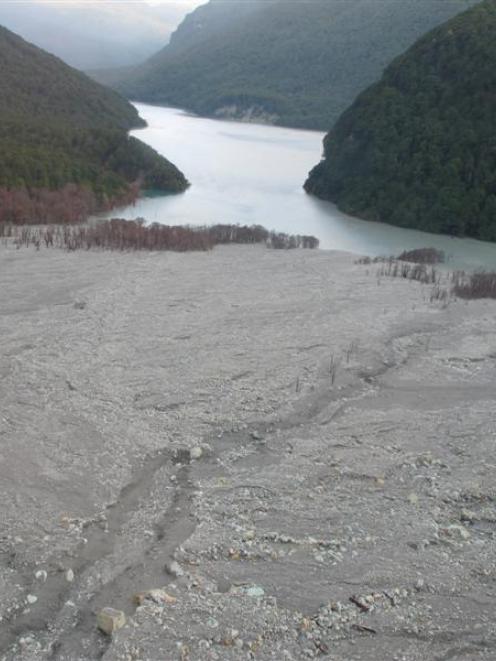 A lake forms last night behind the Dart Valley landslip.  Photo from GNS Science/GeoNet.