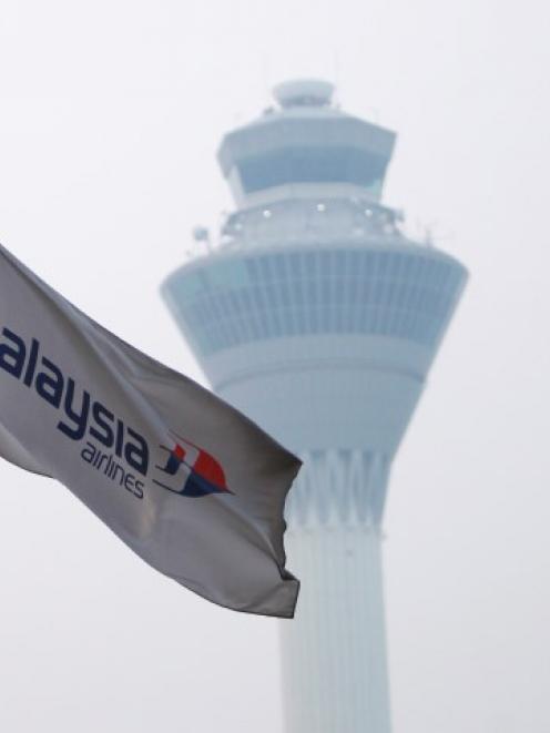 A Malaysia Airlines flag flies at Kuala Lumpur International Airport in Sepang. REUTERS/Samsul Said