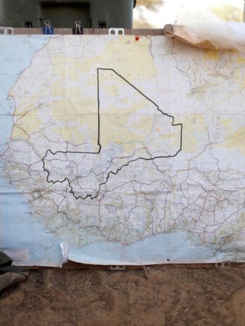 A map of Mali is seen at the French military base camp at Timbuktu's airport. REUTERS/Benoit Tessier