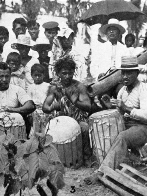 A native band at Aitutaki, Cook Islands, during the visit of the Governor of New Zealand, Lord...