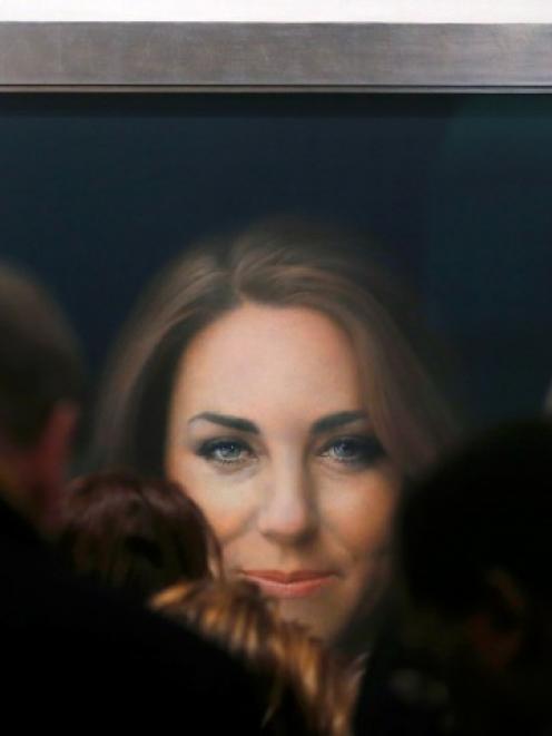 A newly commissioned official painting of Catherine, Duchess of Cambridge is seen at the National...