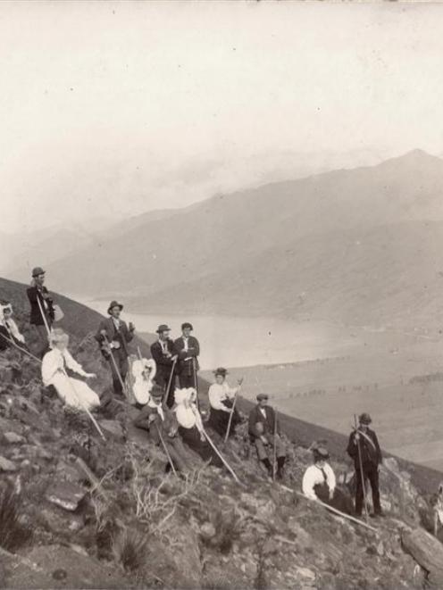 A party of climbers pauses during a trek up the Remarkables, circa 1900. Photo from the Laked...