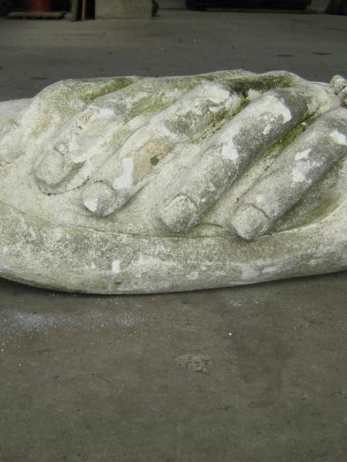 A piece of a stone statue police suspect was used to damage a greenhouse at the Oamaru Public...