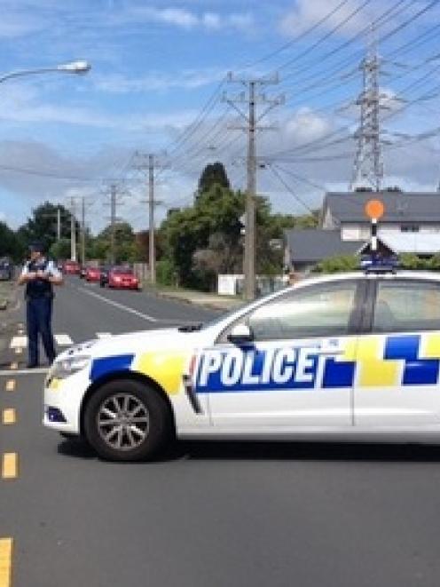 A police cordon at the scene in Albany. Photo NZ Herald