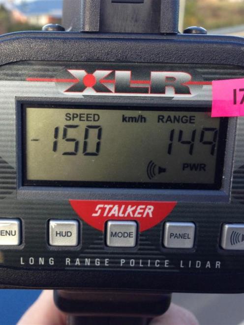 A police handheld laser camera shows the speed at which one motorist was clocked yesterday. Photo...