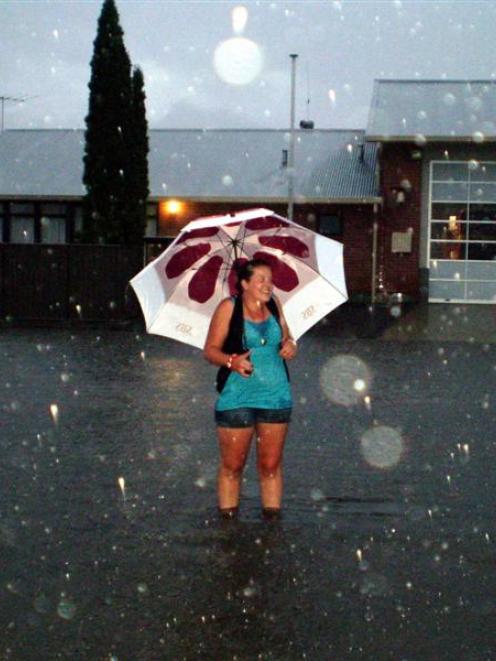 A pond which formed outside the Cromwell Fire Station after the deluge on Thursday night almost...