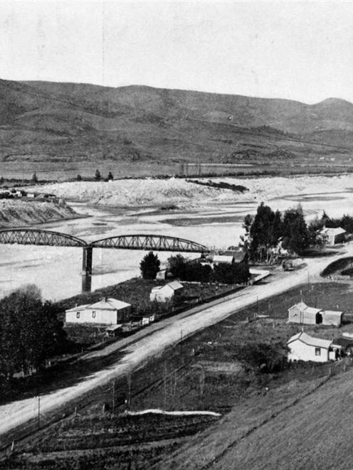 A prosperous Otago farming and gold-mining district: Millers Flat, showing the dredge tailings on...