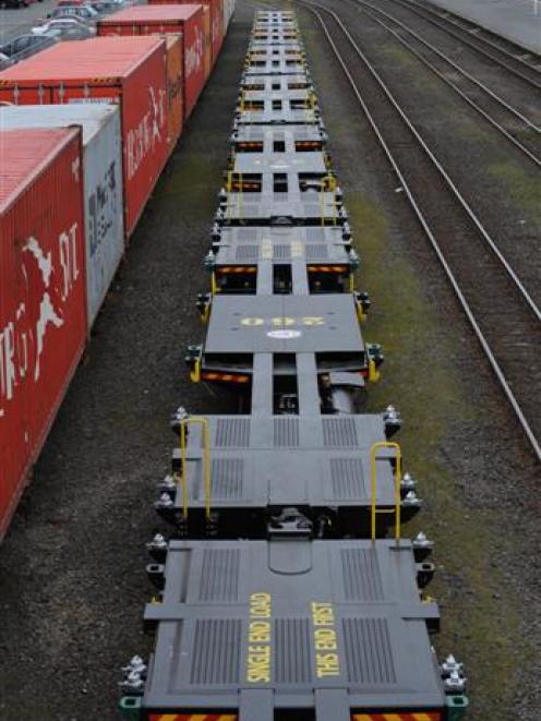 A row of new rail wagons, capable of carrying up to 72 tonnes of cargo, sits at the Dunedin...