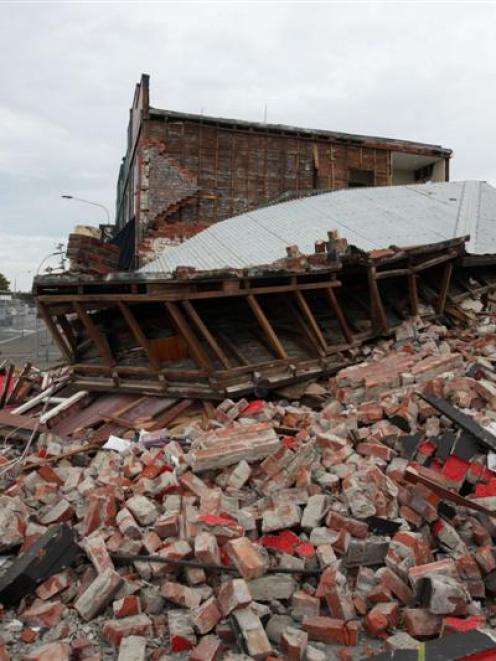 A ruined house at the corner of Ferry Road and Lancaster St. Credit:NZPA / Pam Johnson.