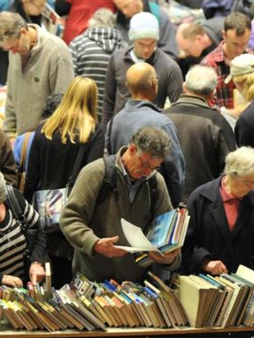 A section of the large crowd look for bargains at the Star Regent 24 Hour Book Sale at the Regent...