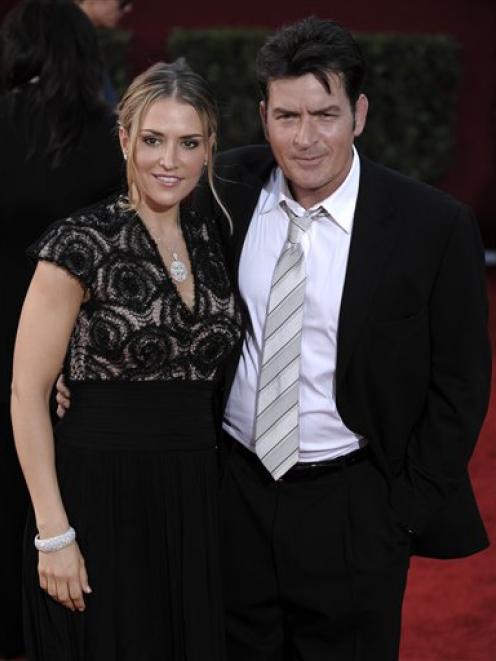 A September 2009 AP photo of actor Charlie Sheen, right, and wife Brooke Mueller.
