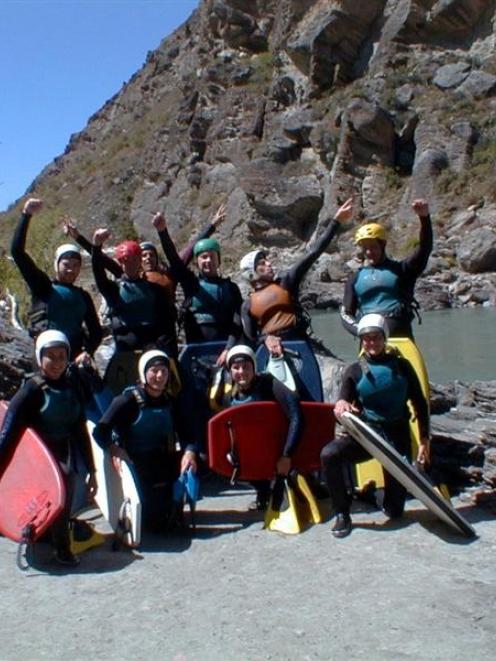 A Serious Fun Riversurfing trip near Roaring Meg from the 1997-98 season. The orange-vested...