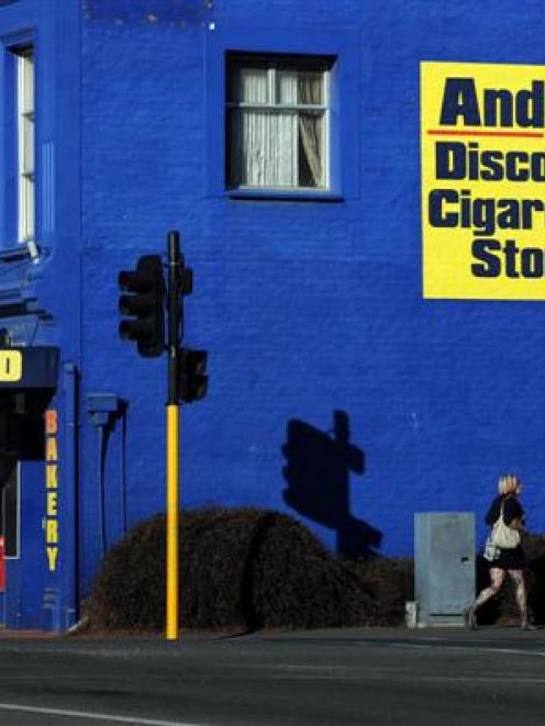 A sign on Andy's Milk Bar in Mosgiel yesterday, which is illegal under the new smoke-free...