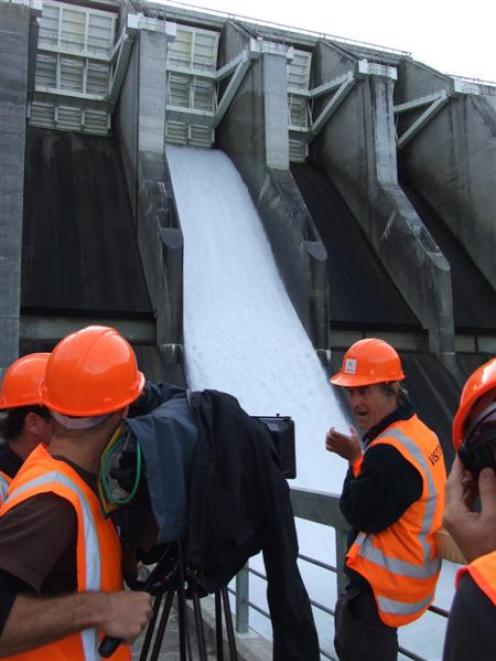 A spillway is opened at the Clyde Dam yesterday for a television documentary about New Zealand...