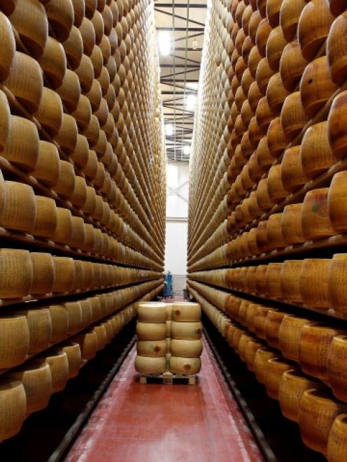 A storage area for Parmesan cheese wheels is pictured at a warehouse owned by Credito Emiliano...