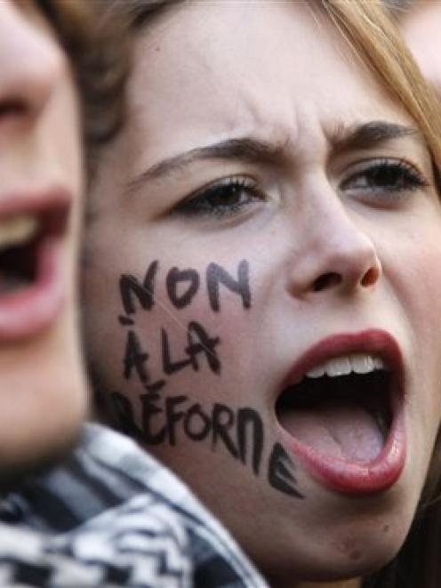 A student shouts slogans during a demonstration in Paris yesterday. (AP Photo/Francois Mori)