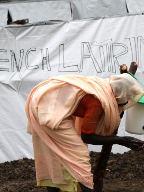 A Sudanese refugee washes her hands in Gendrassa camp in Maban, Upper Nile State, South Sudan, on...