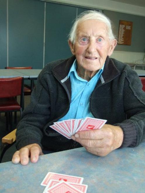 A three-hour cards session is one of the high points of the week for Heck Clare, who turns 100...