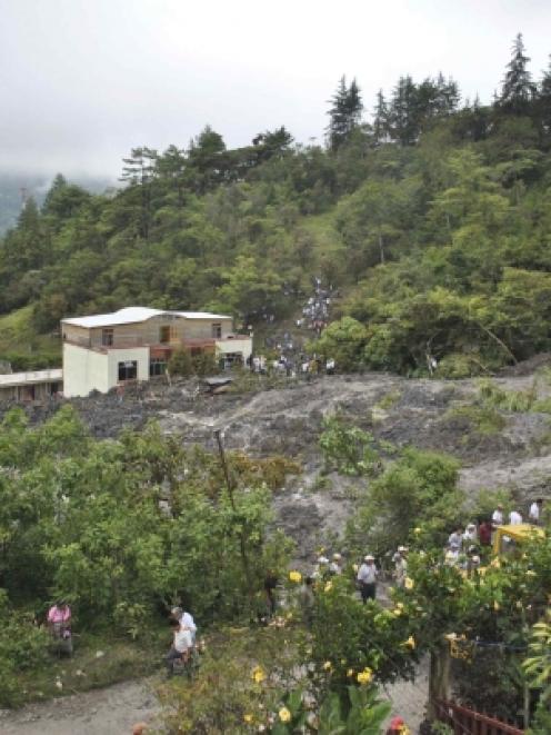 A view of the disaster zone after a landslide in the village of El Manantial, Santa Cruz Barillas...