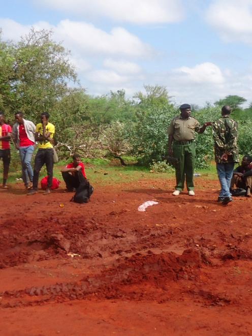 A view shows the scene where attackers ambushed a Nairobi-bound bus outside Mandera town, near...